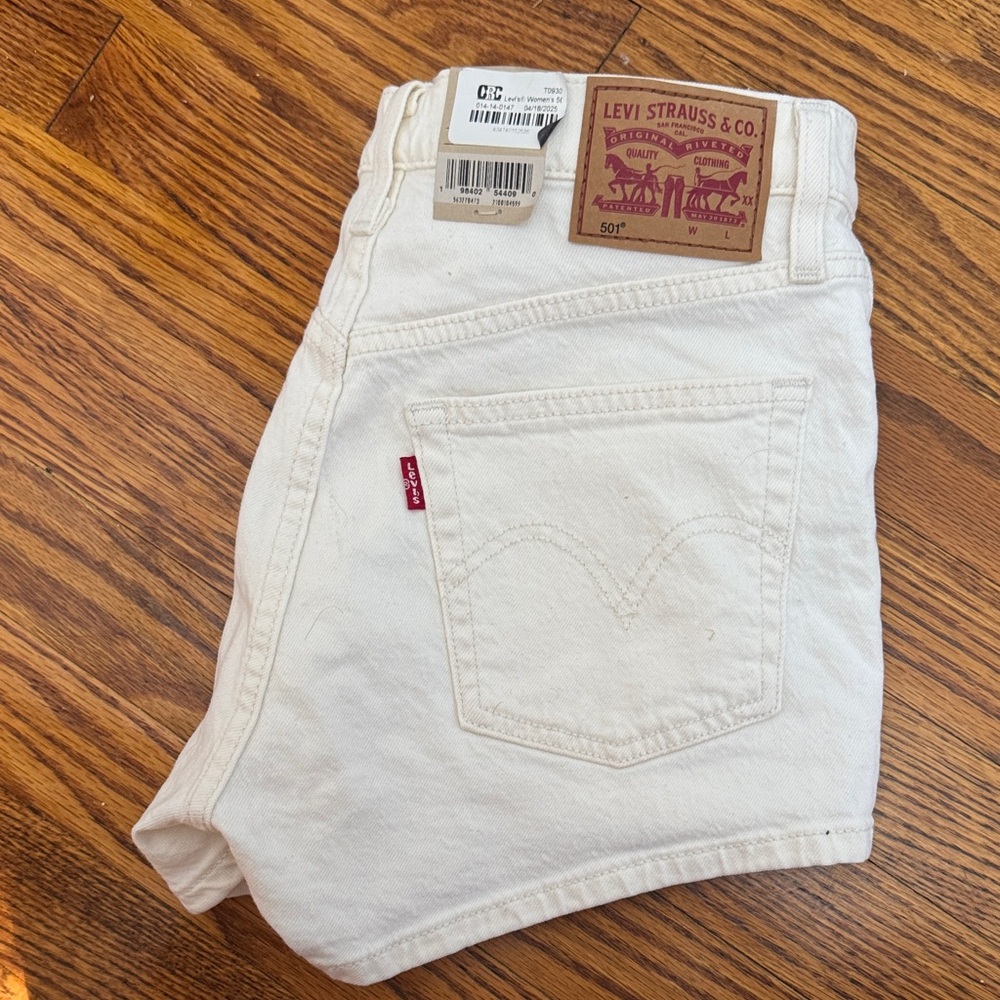Levi's Cream Denim Shorts.